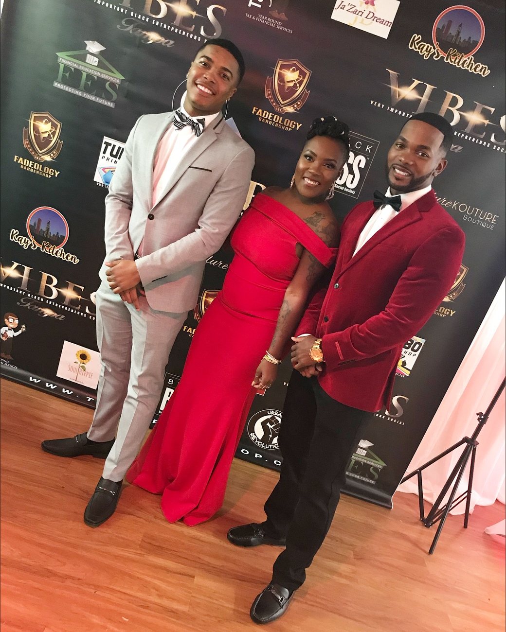 Brandon dressed up with family at a red-carpet event