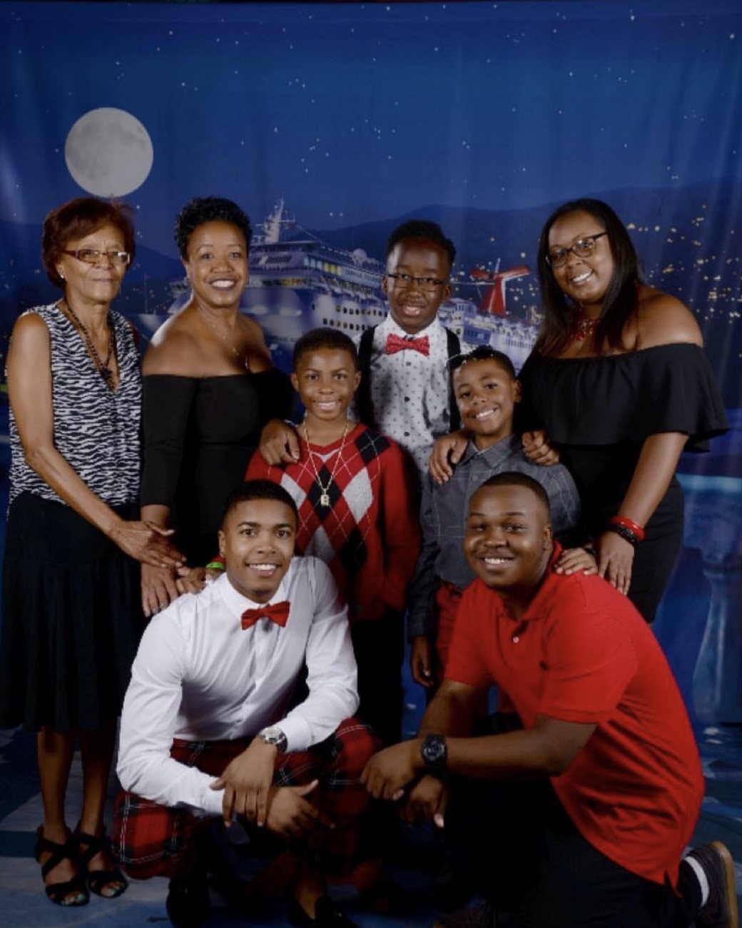 Brandon with his family, dressed up for a portrait