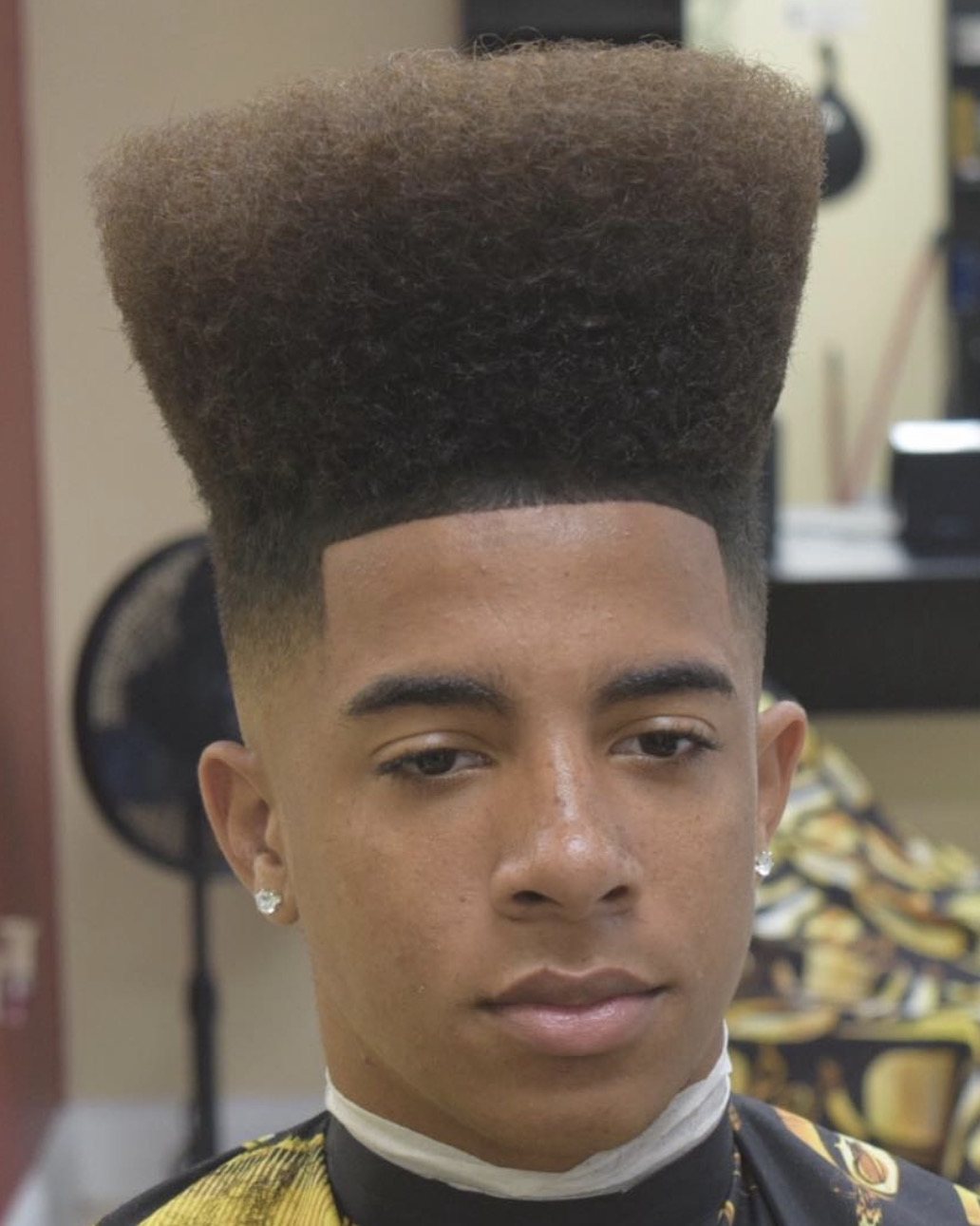 Classic high-top with a crisp line-up and fade