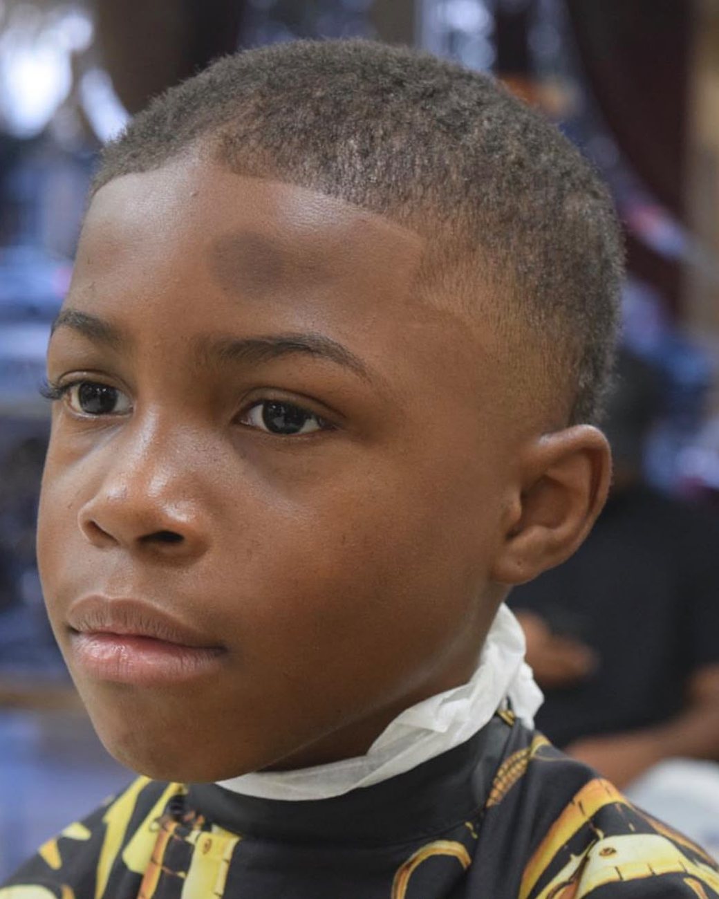 Young client with a crisp line-up and fresh cut