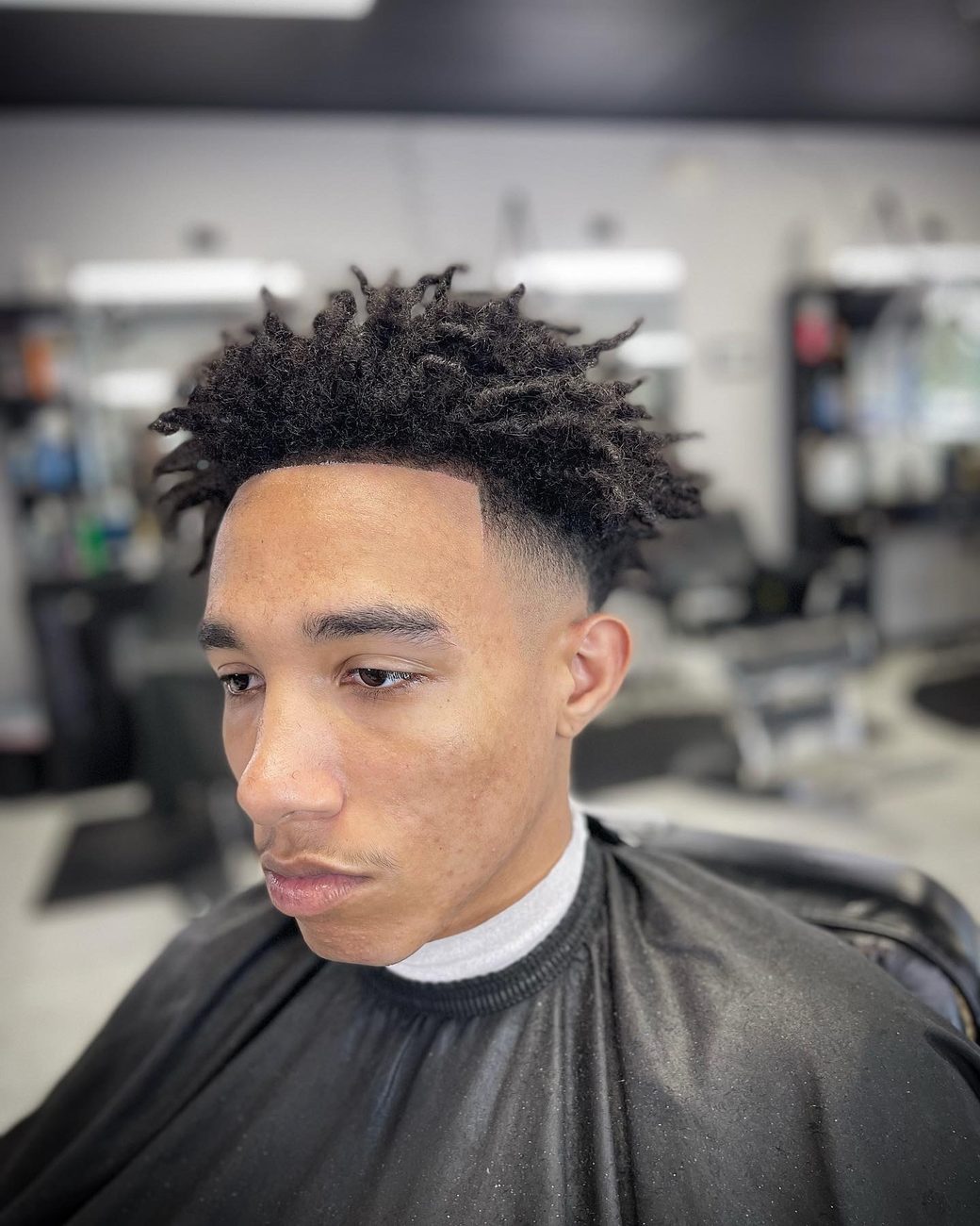 Twist sponge top with a taper fade