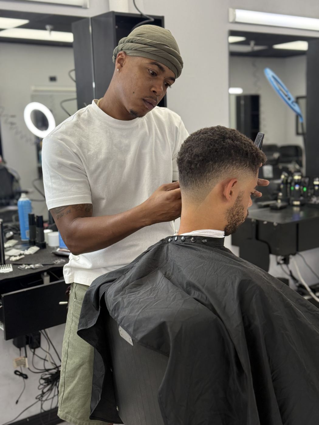 Brandon blending a fade with clippers