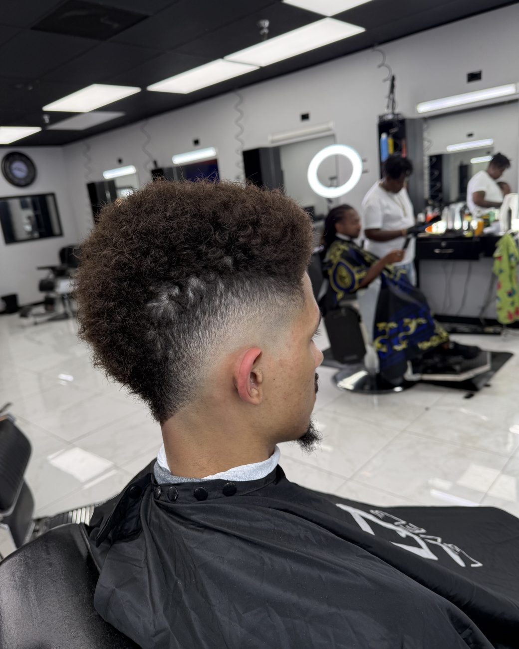 Curly burst fade, side profile