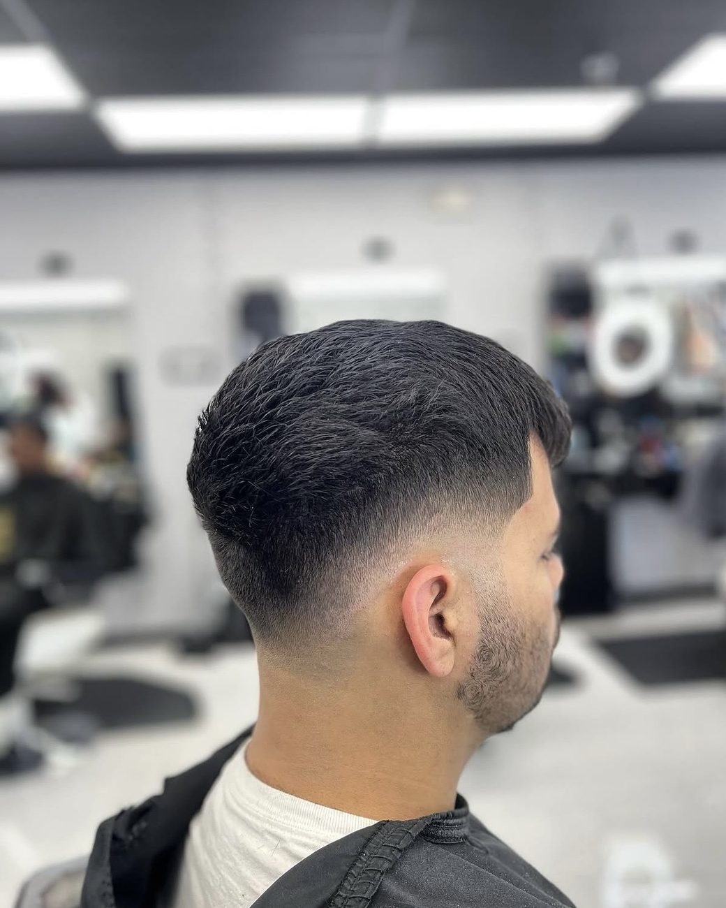 Low taper fade, back view